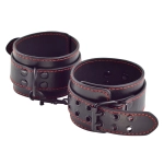 Leather handcuffs with studs on the legs