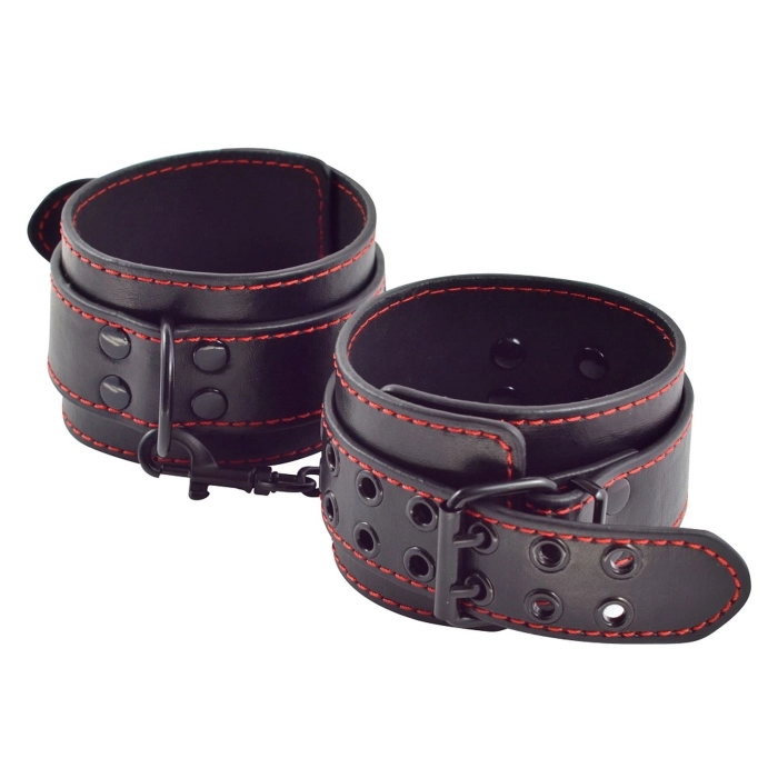 Leather handcuffs with studs on the legs