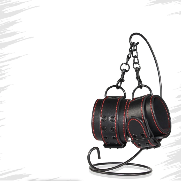 Leather handcuffs with studs on the legs