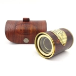 Brass and leather telescope in a leather case