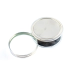 Folding magnifier in a steel housing
