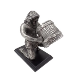 Aquarius - a decorative metal figurine on a wooden base