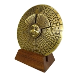 Brass perpetual calendar on a wooden base