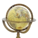 Decorative globe on a brass base