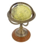 Decorative globe on a brass base