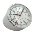 Metal clock on the desk