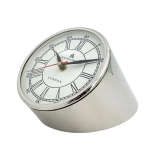 Metal clock on the desk