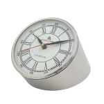 Metal clock on the desk
