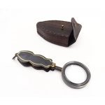 Travel magnifier in a leather case