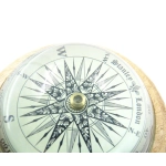 Brass compass on the desk