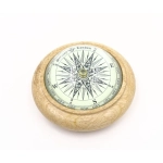 Brass compass on the desk