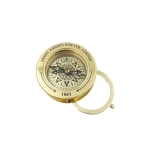 Tourist compass with magnifying glass and 40 years calendar