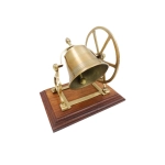Brass rotating bell on a wooden base