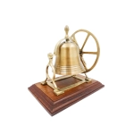 Brass rotating bell on a wooden base