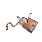 Magnetic compass in a leather case