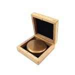 Tourist compass in a wooden box