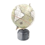 Decorative globe on a stone base