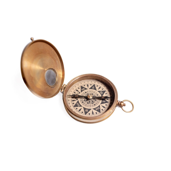 Brass compass in wooden box
