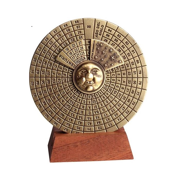 Brass perpetual calendar on a wooden base