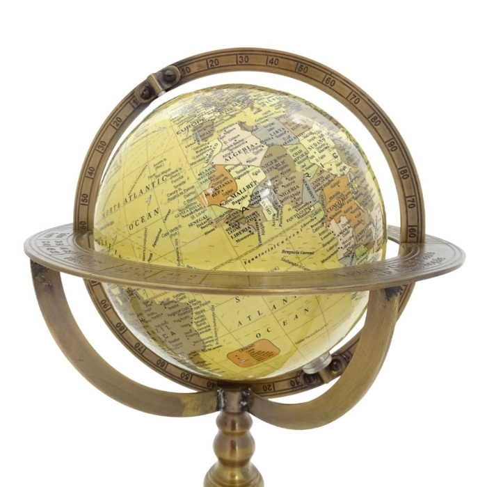 Decorative globe on a brass base
