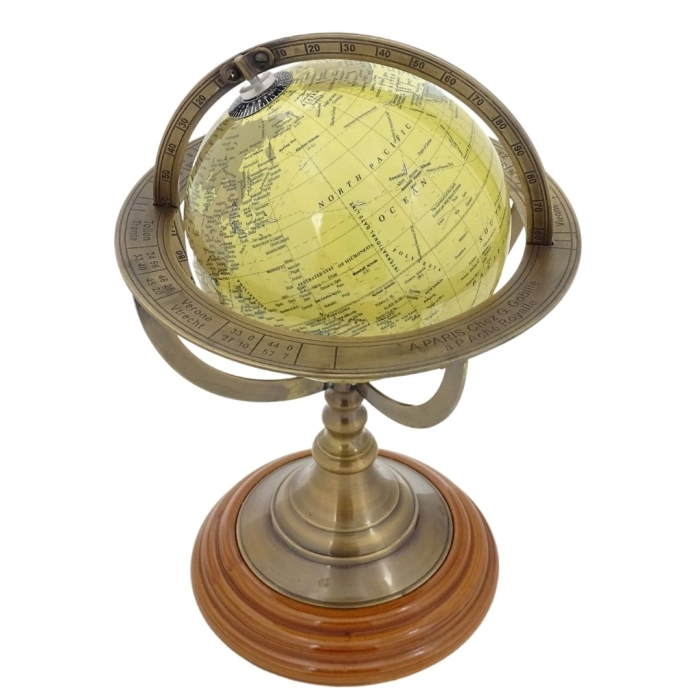 Decorative globe on a brass base