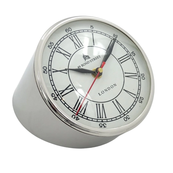 Metal clock on the desk