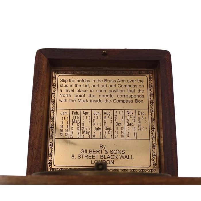 A compass with a Gilbert sundial in a wooden case
