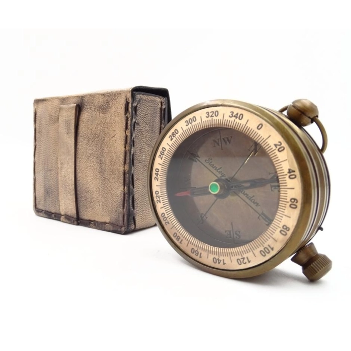 Brass compass in a leather case