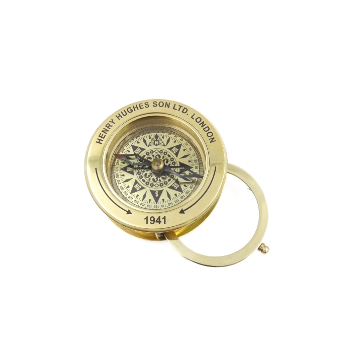 Tourist compass with magnifying glass and 40 years calendar