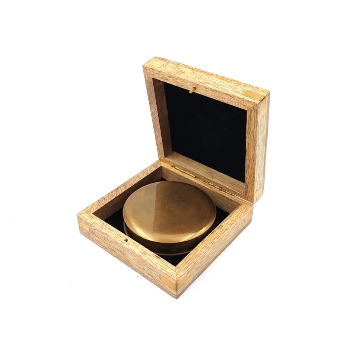 Tourist compass in a wooden box