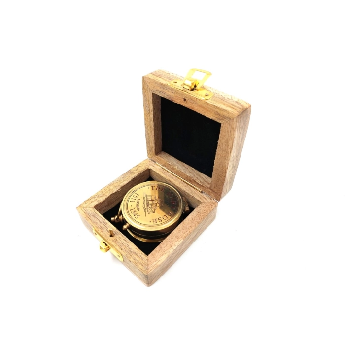 Brass compass with sundial in a wooden box