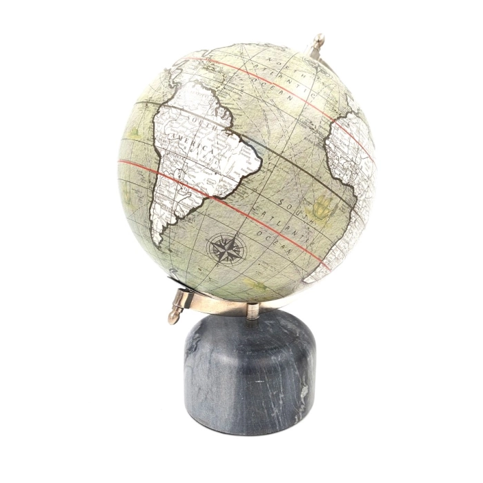 Decorative globe on a stone base
