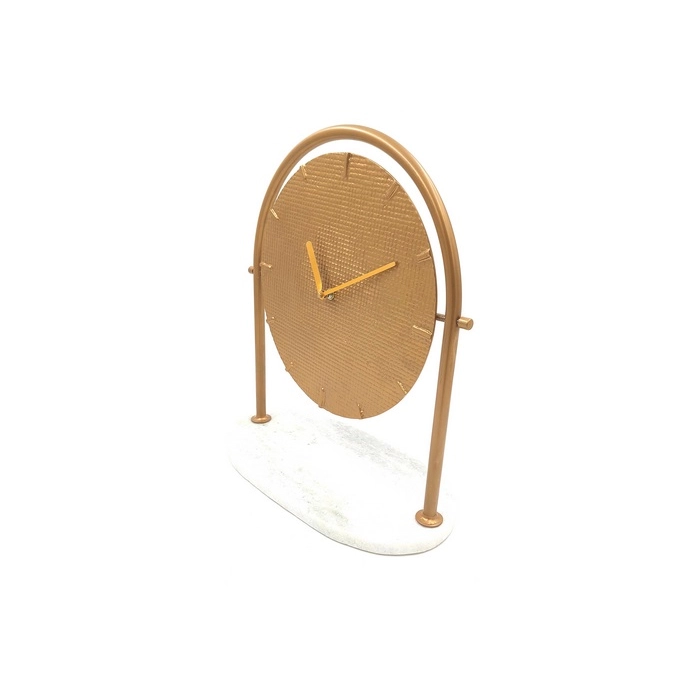 Round metal clock on a marble base