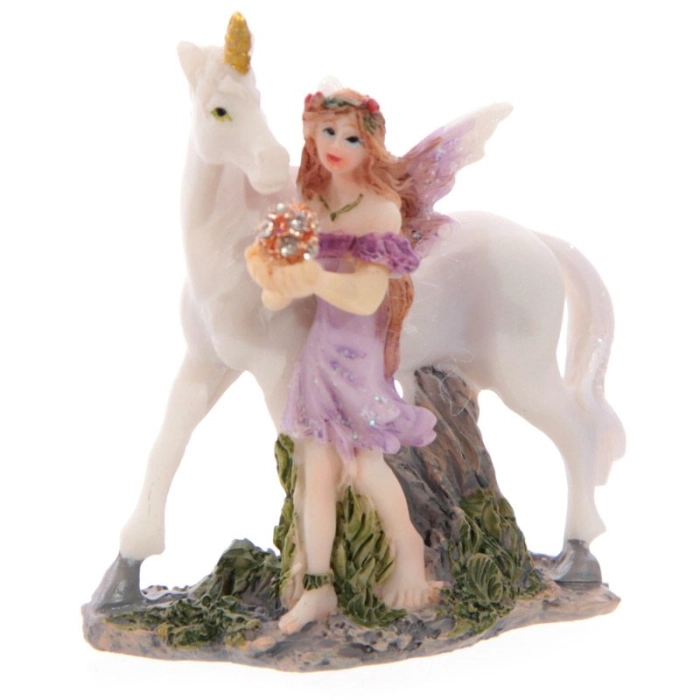 Figurine forest fairy with a unicorn in a bag
