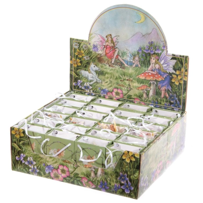 Figurine forest fairy with a unicorn in a bag