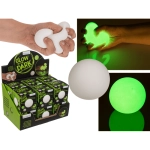 White anti-stress ball glowing in the dark