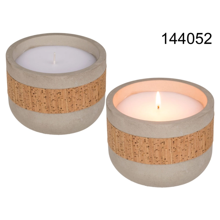 A candle in a cement pot with a cork decoration