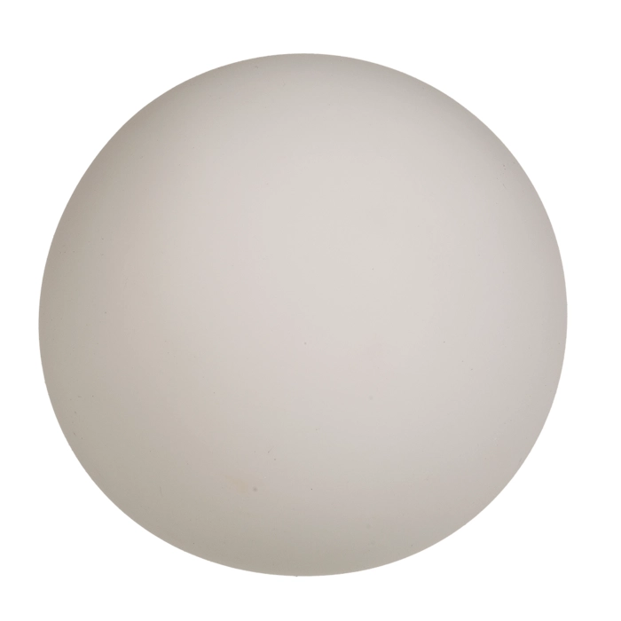 White anti-stress ball glowing in the dark